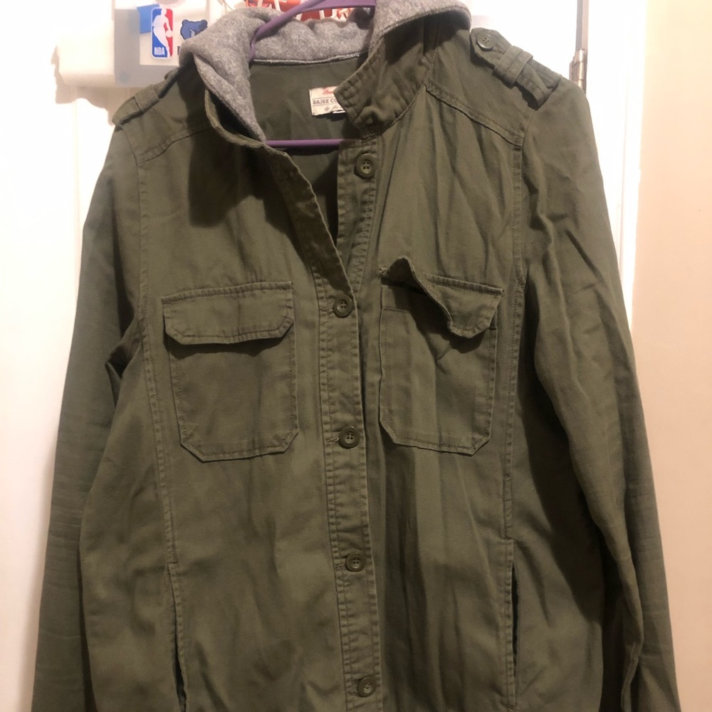 Woman’s green hoodie jacket with pockets